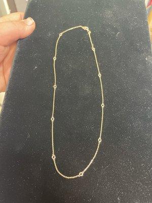 14k yellow gold necklace with .25ct Diamonds