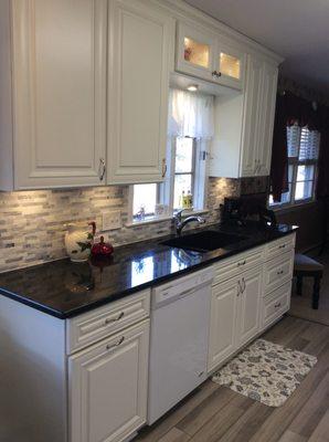 New sink and faucet, beautiful granite, very pleased.