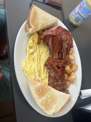 White toast buttered, bacon, 2 eggs scrambled, home fries