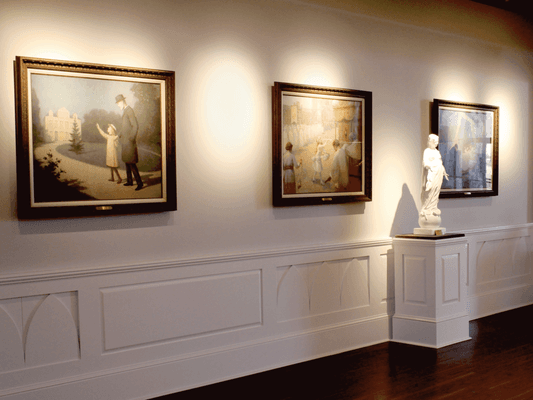 Painting of St. Therese's life and a replica of the Our Lady of the Smile statue that cured St. Therese of her childhood illness.