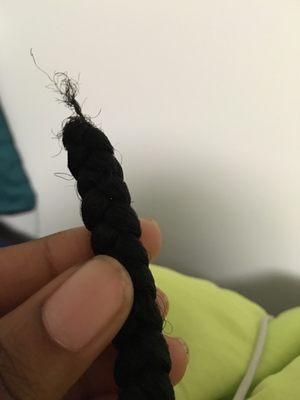 One of the braids that pulled out my hair. Right in the front and leaving me without the hair bulb.    Save the Edges!