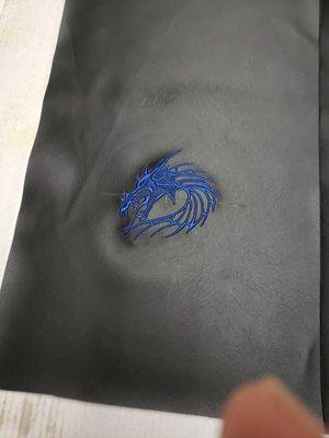 Dragon embroidery on black vinyl