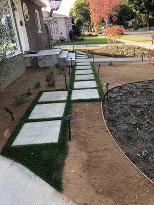 Stepping stones walkway from the driveway to the front door