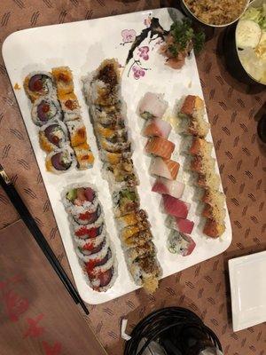 Top left is Mexico roll. Under that is the New York roll. Then from left to right: butterfly roll, rainbow roll and volcano roll