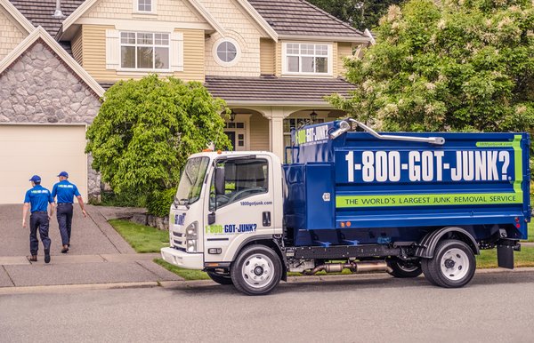 1-800-GOT-JUNK? Long Island East truck team arriving at a customer's place