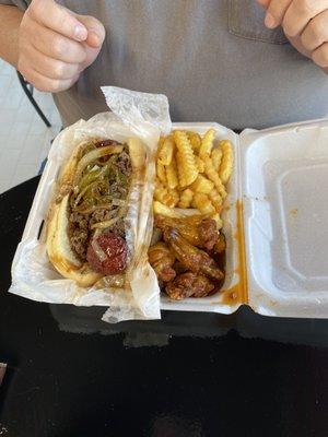 Polish dawg with seasoned ground beef and peppers,  wings with sweet heat sauce and seasoned fries.