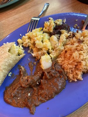 $12 for a plate of eggs and potatoes, rice and beans!