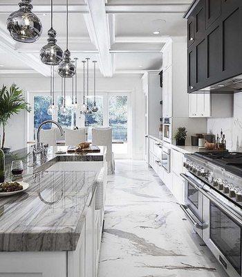 Kitchen countertops with mitered edge and this upscale kitchen