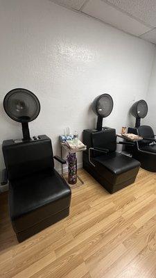 Back room where you wait under the heaters for hair treatments