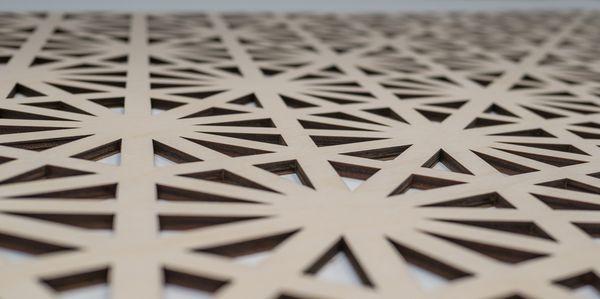 Laser cut wood.