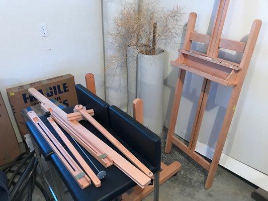 Art easel was left disassembled and missing parts.