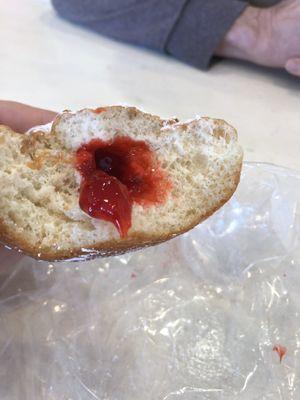 Sufganiyot. A tiny dollop of jelly inside:(