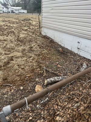 This is my yard after they came and placed hay. Uneven, rocky, unsafe!