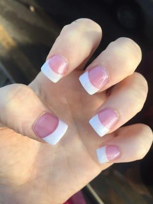 Acrylic French tip w/ sparkles. In love, definitely coming here for a fill in.