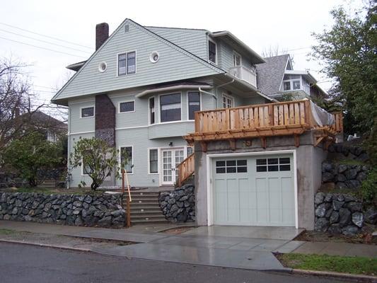 Basement & bunker garage addition under existing home in Seattle.