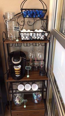 Beverage bar! We serve Coffee, tea, water, infused water, beer or wine. All drinks are complimentary with your service!