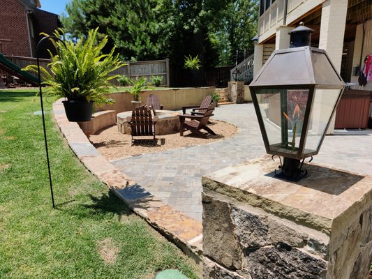 custom firepit, retaining wall with gas lamp