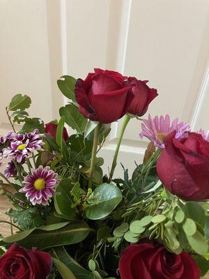 Look at the eaten up wilted leaves and the not fresh roses. Costco's flowers are 100% better, fresher, and cheaper.