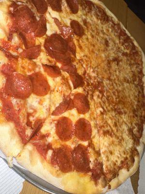 Large half pepperoni and half cheese pizza