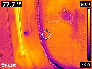 In this infrared picture we find that the faucet is dripping a small amount of water.