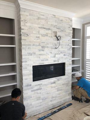 Natural stone ( Marble) on fire place wall. Project in Arlington VA.