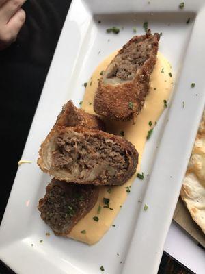 Cheesesteak egg rolls. The awesome cheese sauce compensates for the mediocre egg rolls.