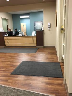 View of the check in desk from the waiting room.