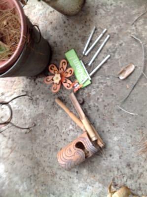 Broken wind chimes they didn't even bother to pick up