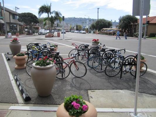 Bike corral FULL of bikes on a summer day!