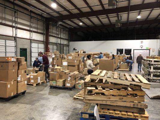 Donated Medical supplies ready to be sorted and stacked.