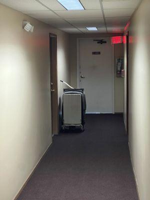 An abandoned dishwasher in my hallway.