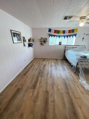 New bedroom vinyl plank flooring installed