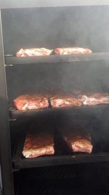 smoker full of ribs