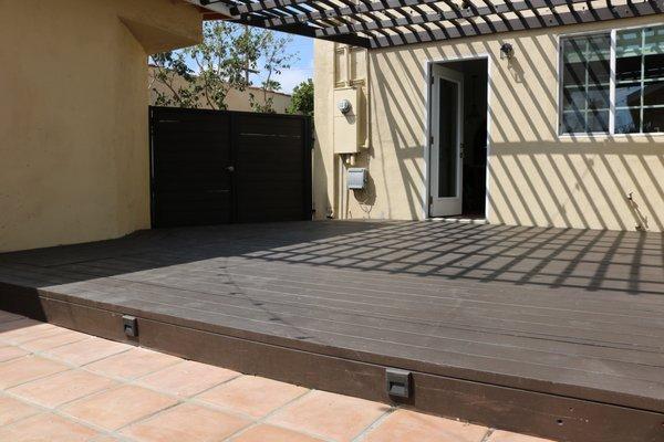 Wooden patio cover & deck + patio tile installation.  Van Nuys, March 2019 Photo and Work done By Total Construction and Remodeling, Inc.