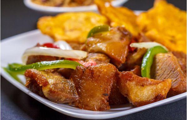 Fried pork plantain  rice and beans