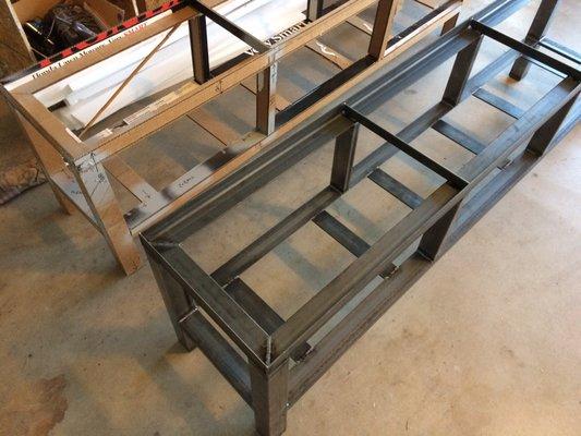 Metal bench framework for under large window.  Visualize with padded seats and rustic wooden drawers.