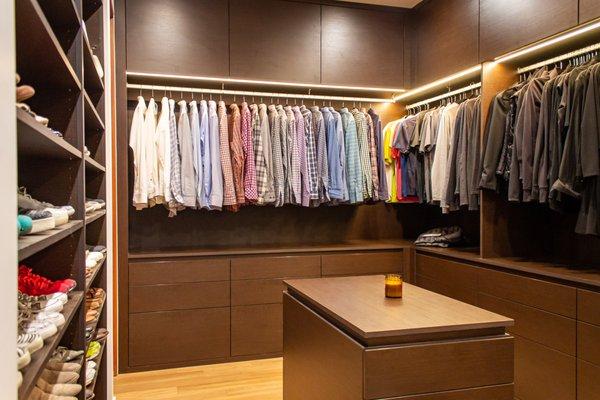 Custom closet with under-cabinet lighting