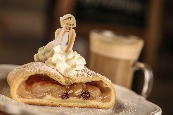 Warm apple strudel topped with edible Marilyn Monroe wafer and real whip cream "dress"