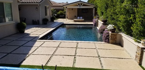 Stain and Seal back concrete patio.