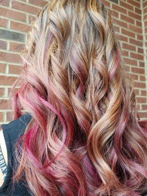 Caramel highlights and some pink colored pieces.