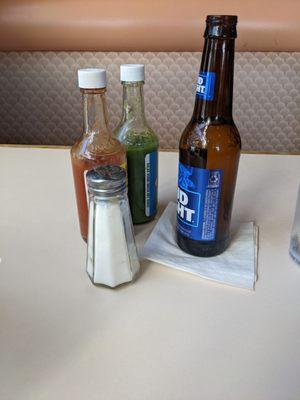 Beer and condiments that were brought to the table