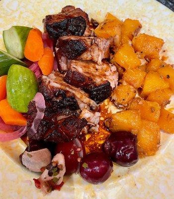 Hot, sticky, spicy pork belly, pickled veg, and garlic ginger butternut squash.