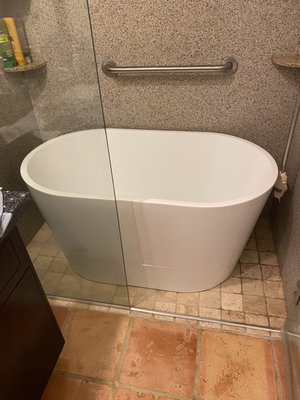 Taking our walk in shower and adding this gorgeous tub.  Wife is thrilled.