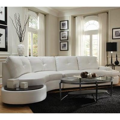 Simple and Sleek Modern sectional with built in table with black top perfect piece for the Modern Glamour Feel. Lease or 
Buy