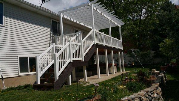 New deck with pergola and stairs.