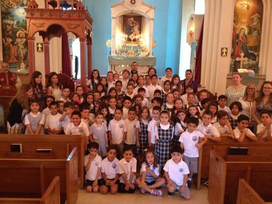 K-6th grade students at the school church.