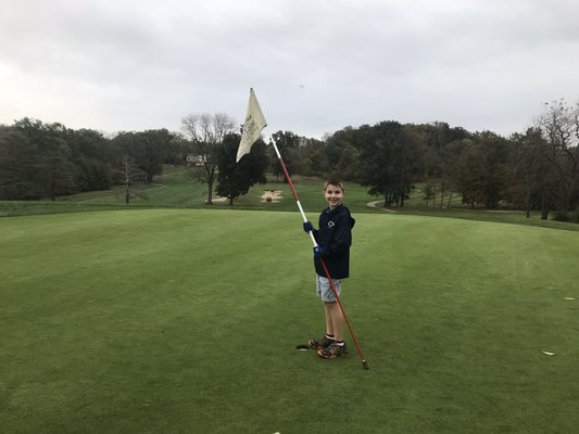 Junior Golfer Playing Lesson