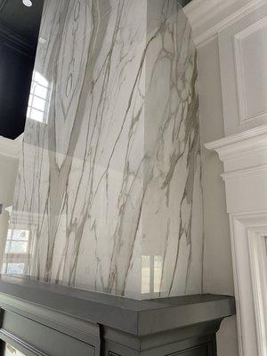 Formal Living Room Fireplace. Book-Matched Porcelain Slabs