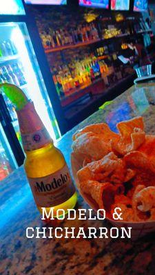 Happy Hour snack!! Chicharron and Modelo..