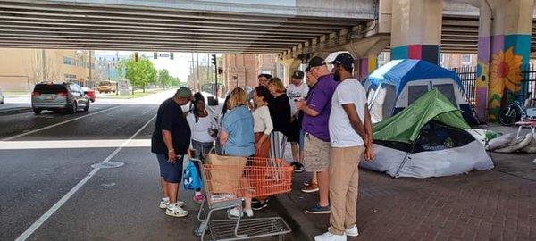 Carrollton UMC parntering with the New Orleans Mission to bring food and prayer to the homeless.